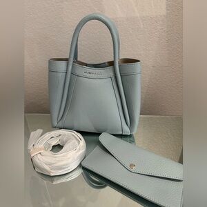 Newbella tote bag size small in blue color , brand new with long handle